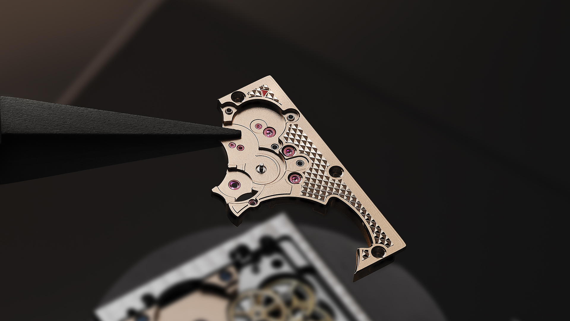 A macro photograph of the jewels in a watch movement.