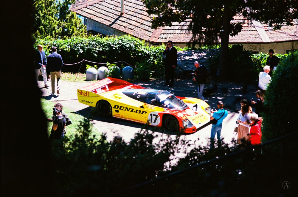 Photograph of Porsche 962-010 on the main approach to Villa Del Grumello