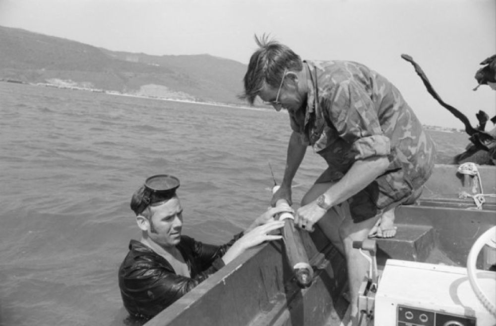 The diving team recovering explosives.