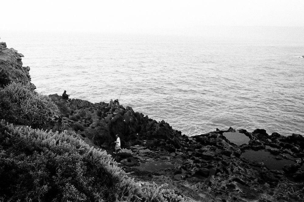 Photograph of fishermen in Morocco.